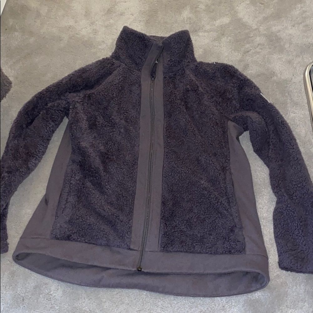 woman’s north face fluffy zip up jacket